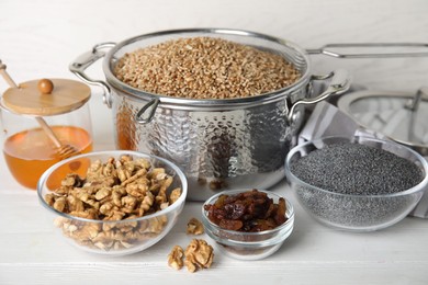 Photo of Ingredients for traditional kutia on white wooden table