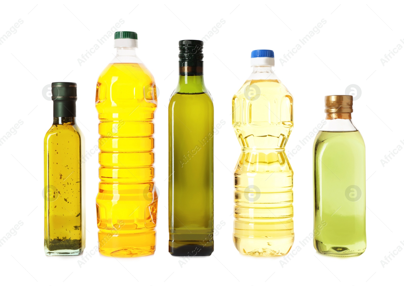 Photo of Bottles with different oils on white background