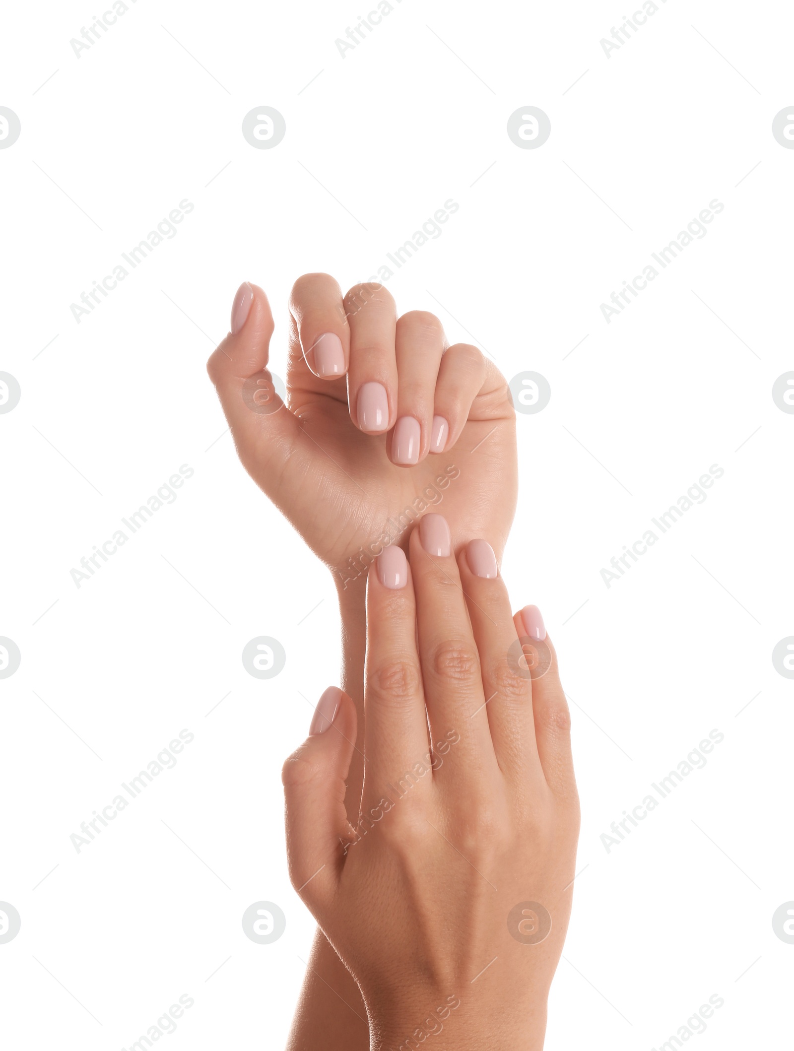 Photo of Woman with beautiful hands on white background, closeup. Spa treatment