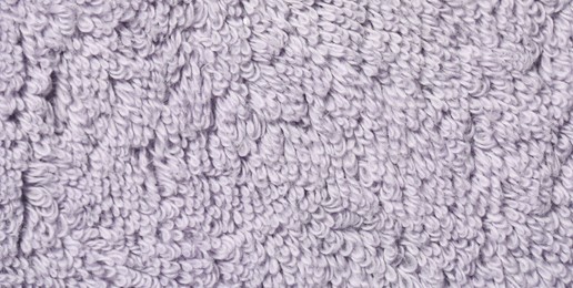 Photo of Texture of soft violet fabric as background, top view