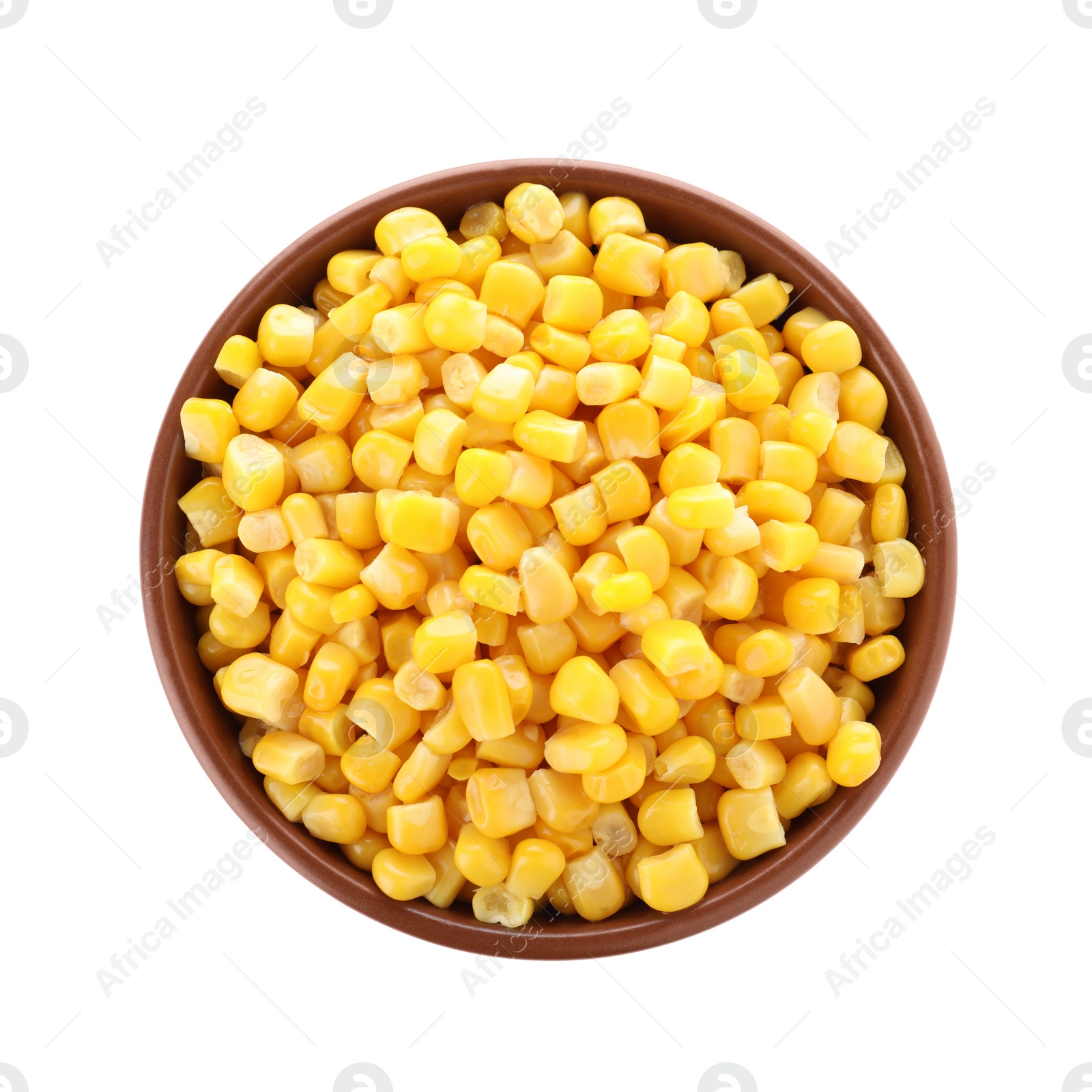 Photo of Delicious canned corn in bowl isolated on white, top view