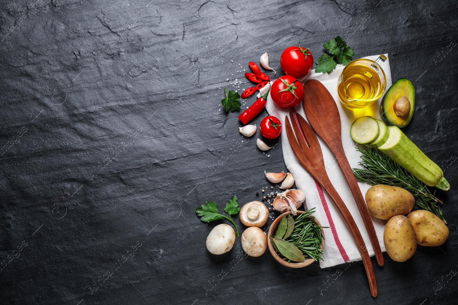 Photo of Flat lay composition with fresh products on grey table, space for text. Healthy cooking