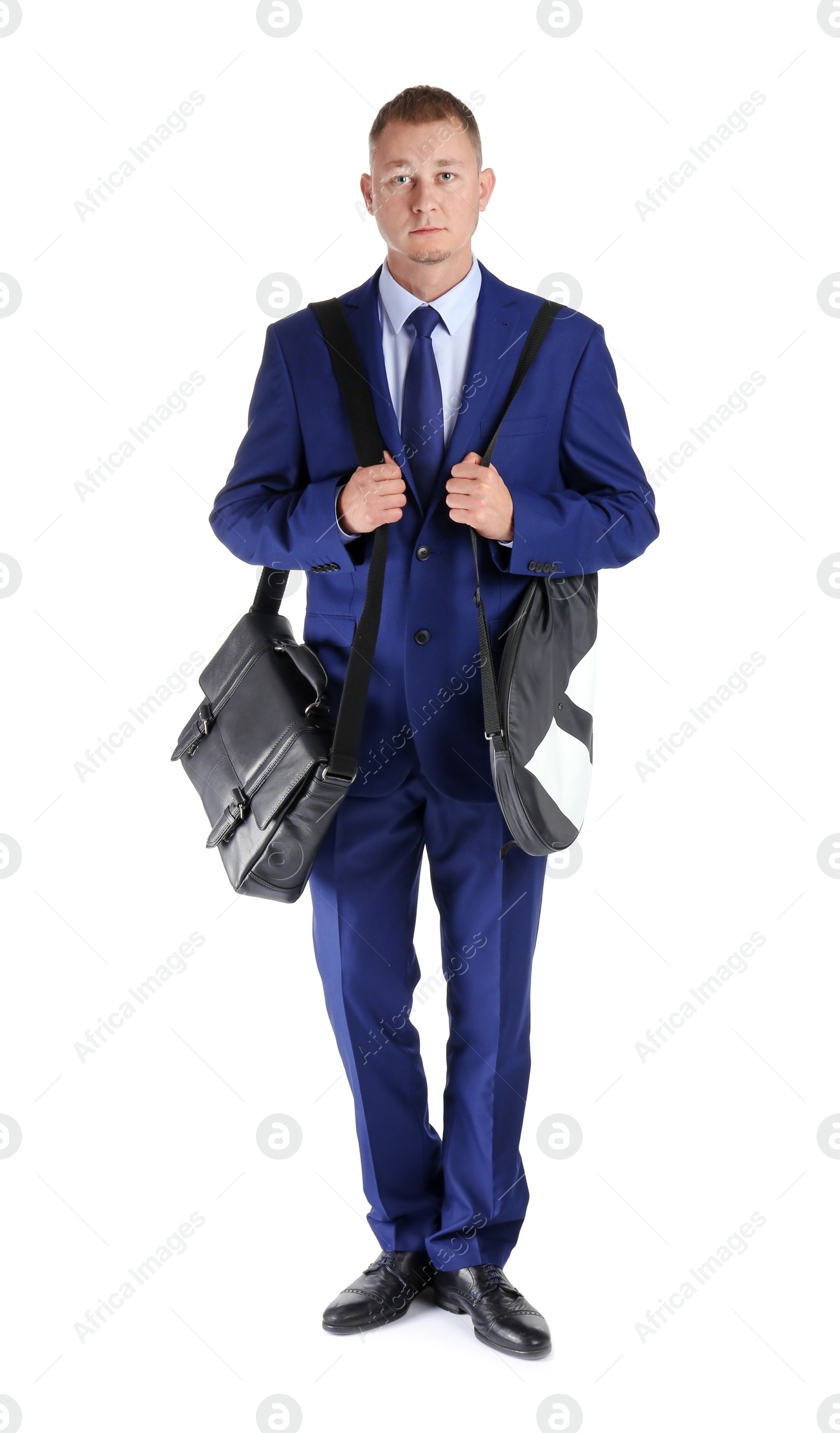 Photo of Full length portrait of businessman with briefcase and tennis racket in cover on white background. Combining life and work