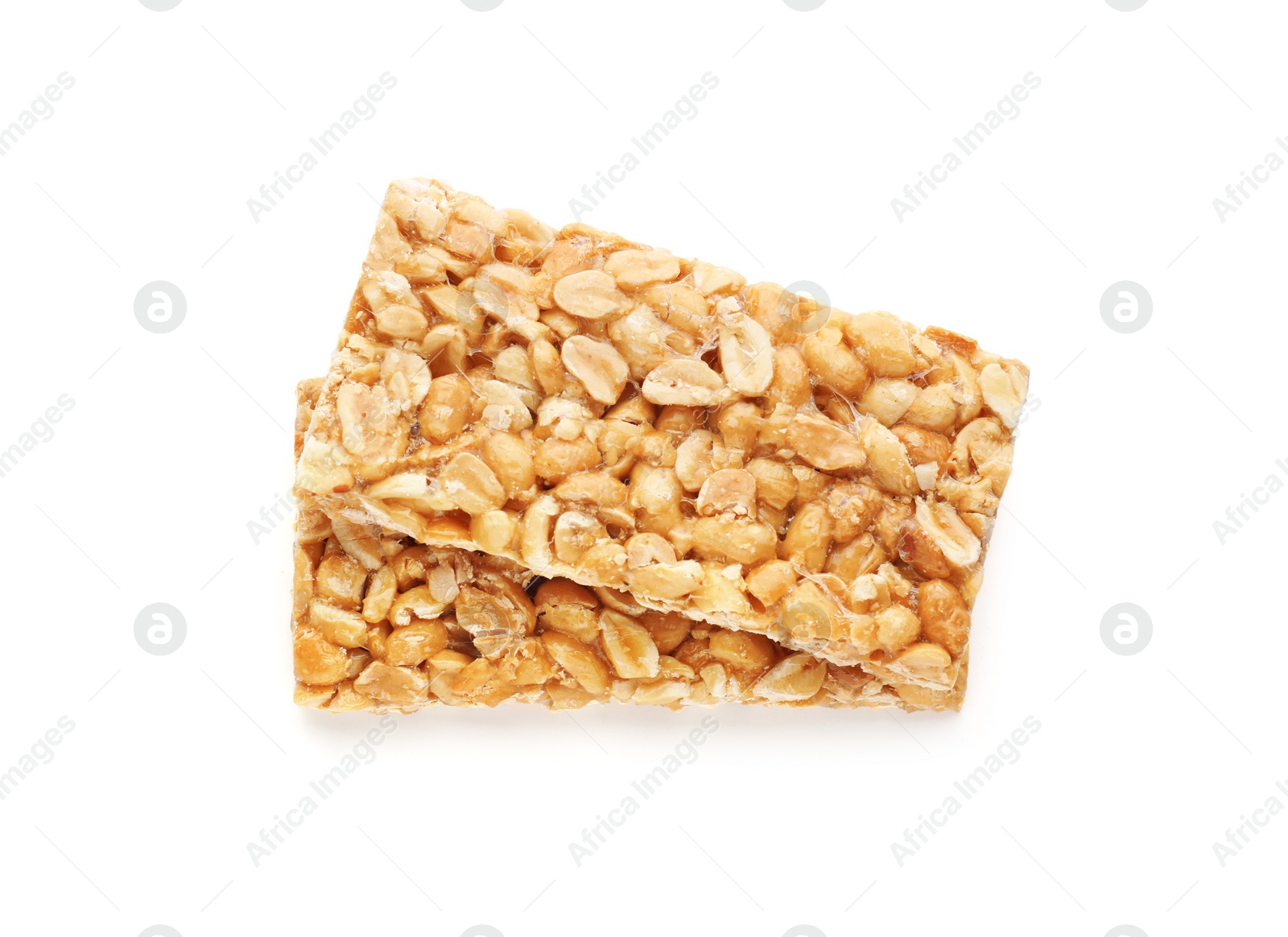Photo of Tasty peanut bars (kozinaki) isolated on white, top view