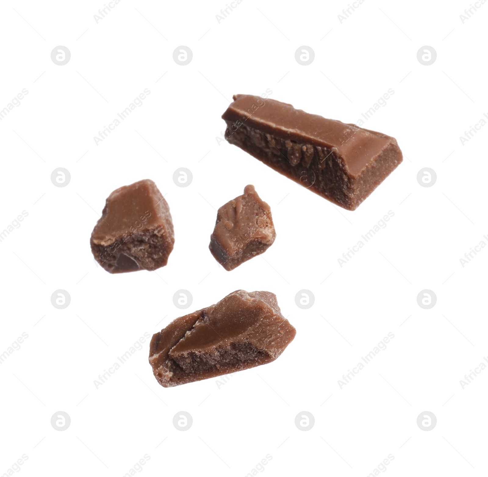 Photo of Pieces of tasty chocolate bar isolated on white