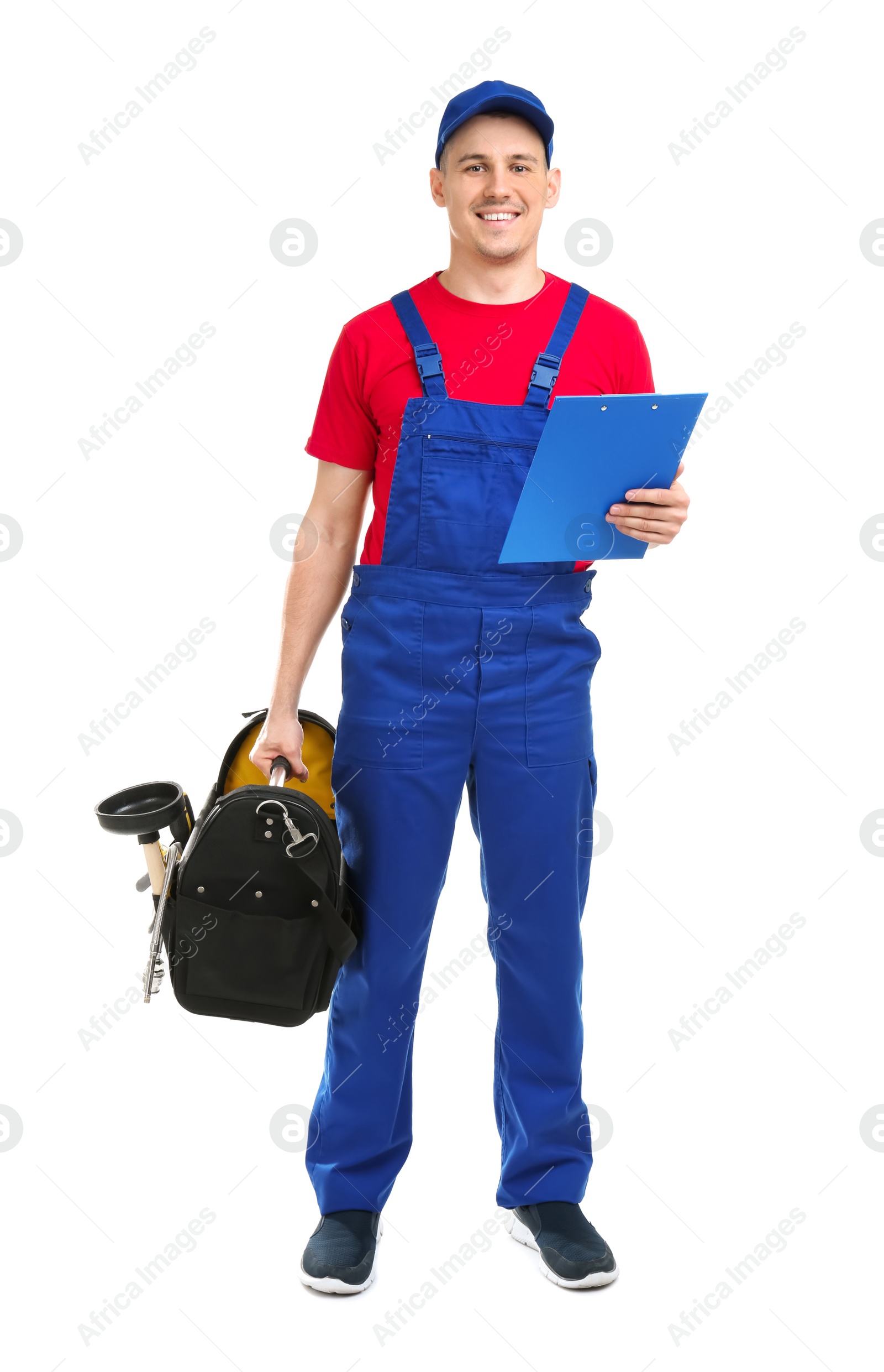 Photo of Young plumber with tool bag and clipboard on white background