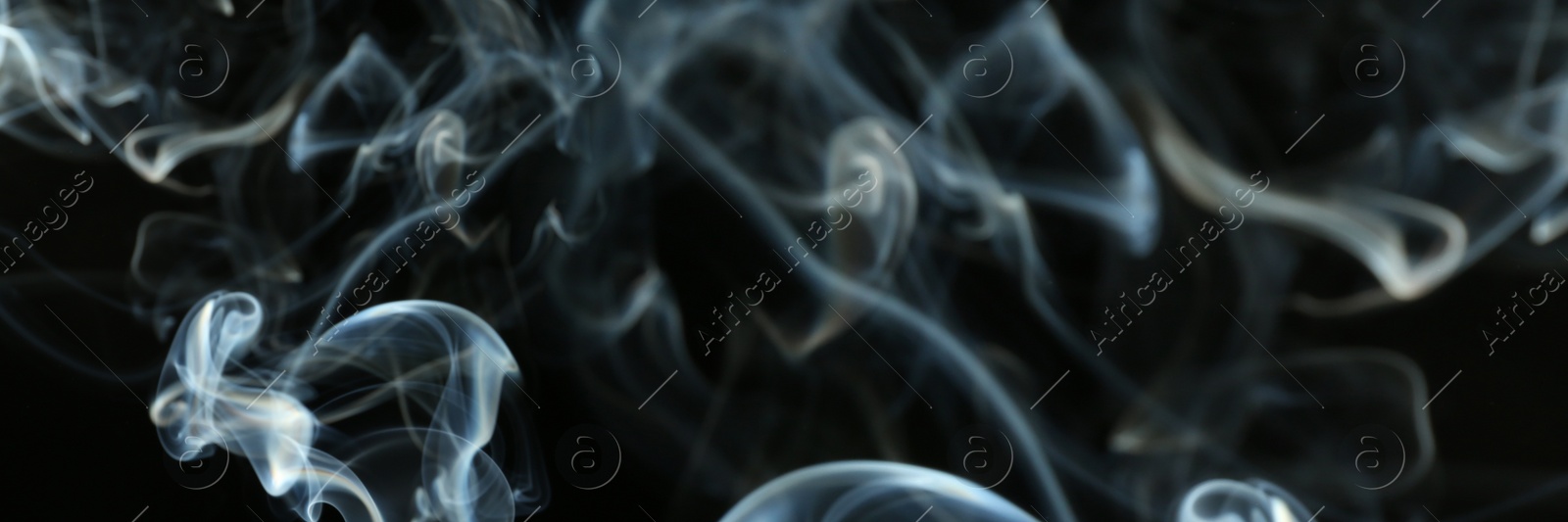 Image of Smoke on black background, closeup. Banner design