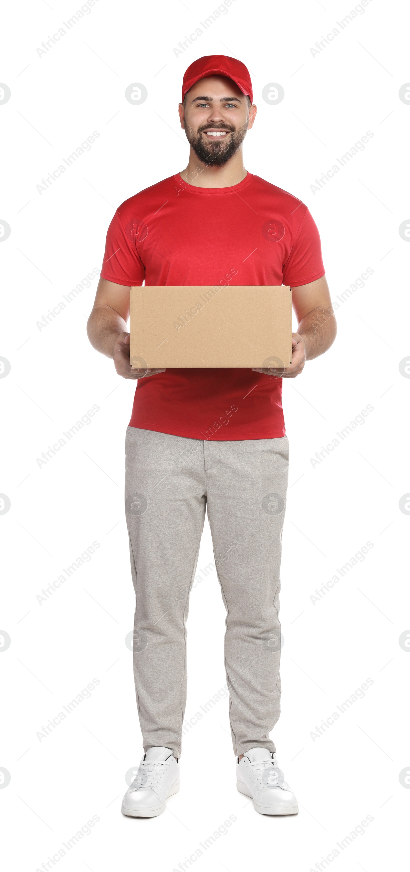 Photo of Courier holding cardboard box on white background