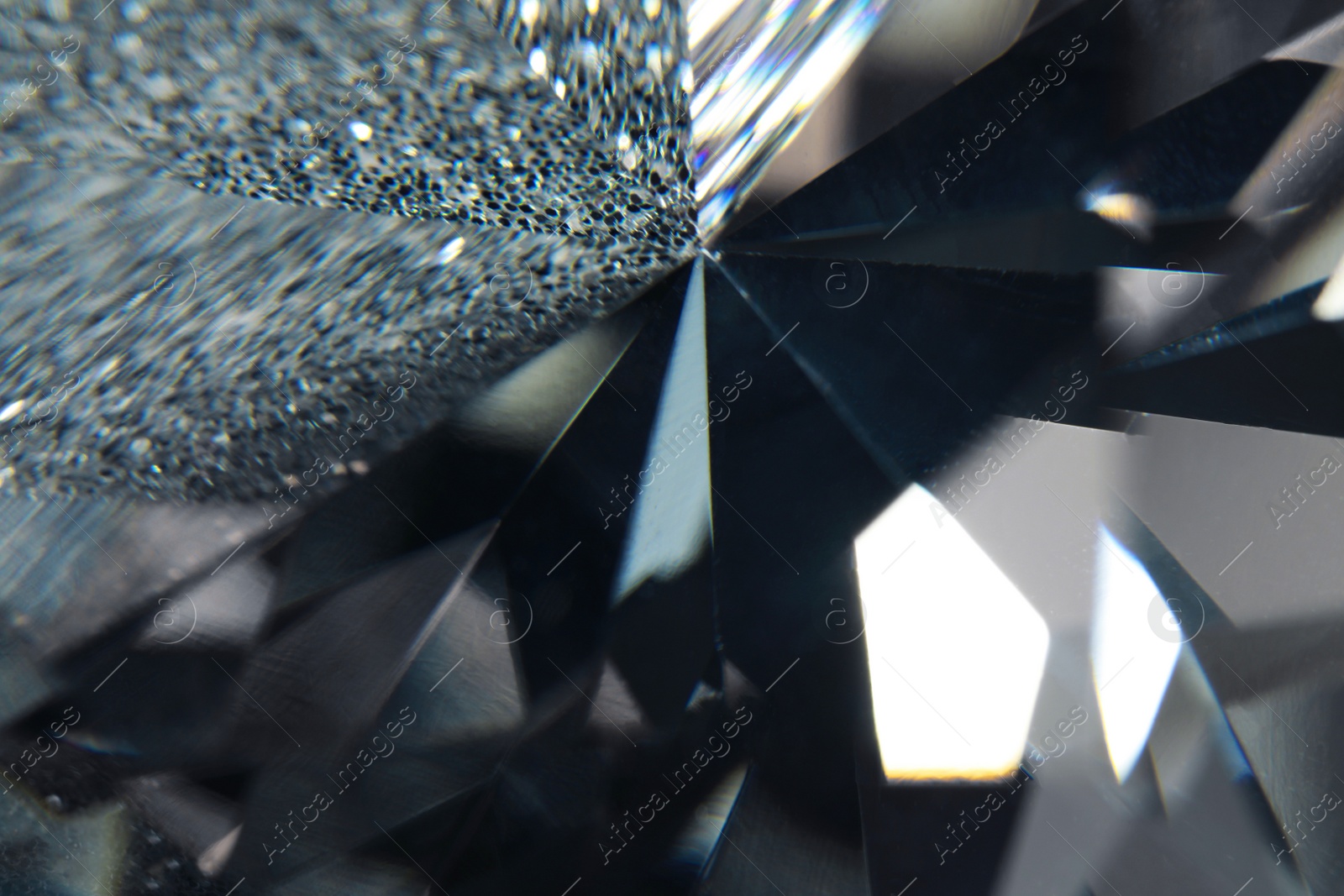 Photo of Beautiful dazzling diamond as background, closeup view