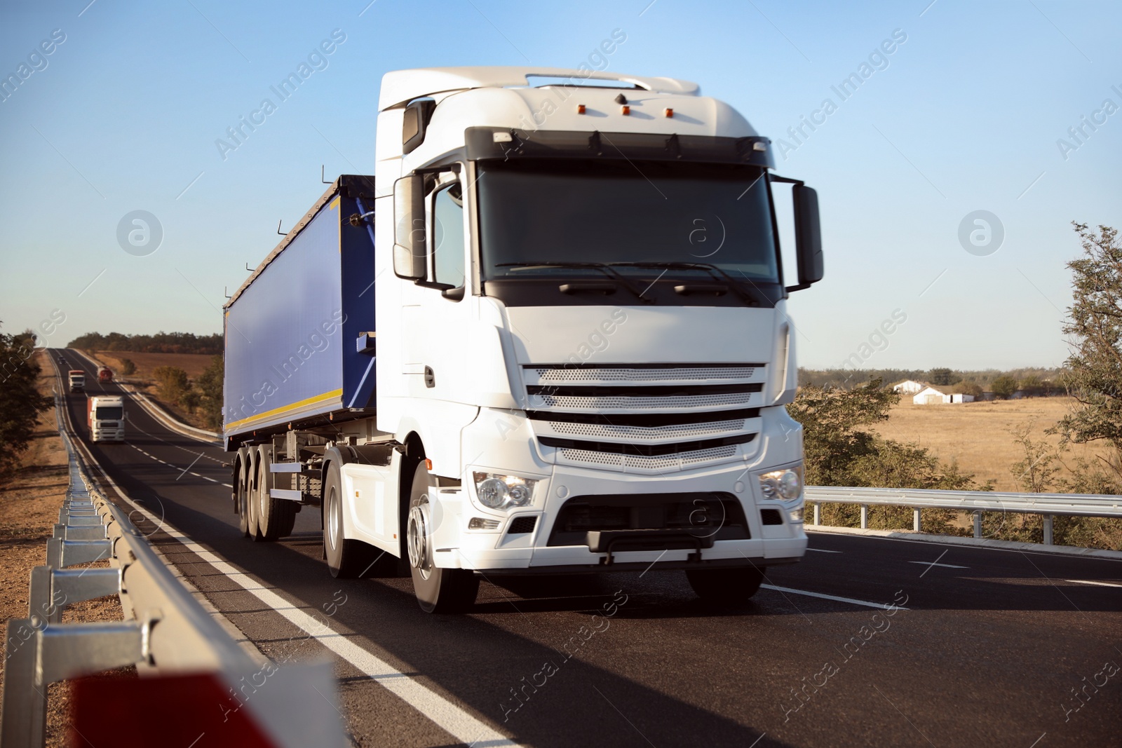 Photo of Beautiful view of asphalt highway with truck. Road trip