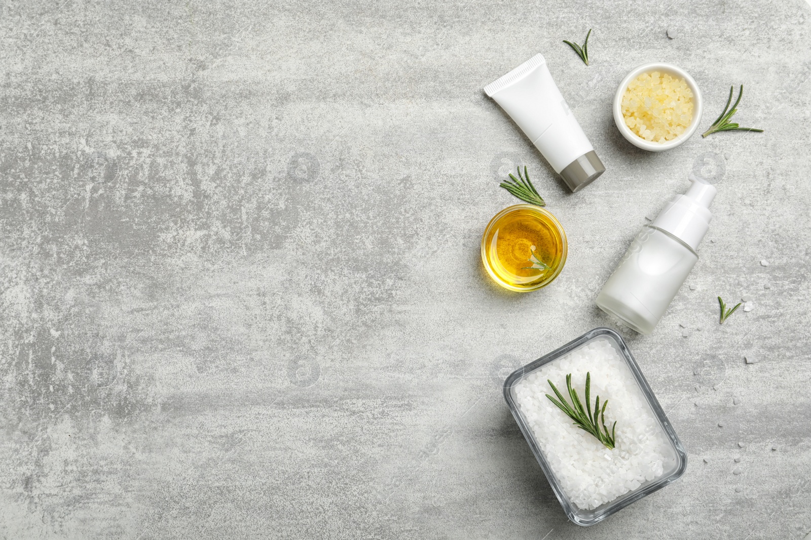 Photo of Homemade effective acne remedies and ingredients on grey background, flat lay