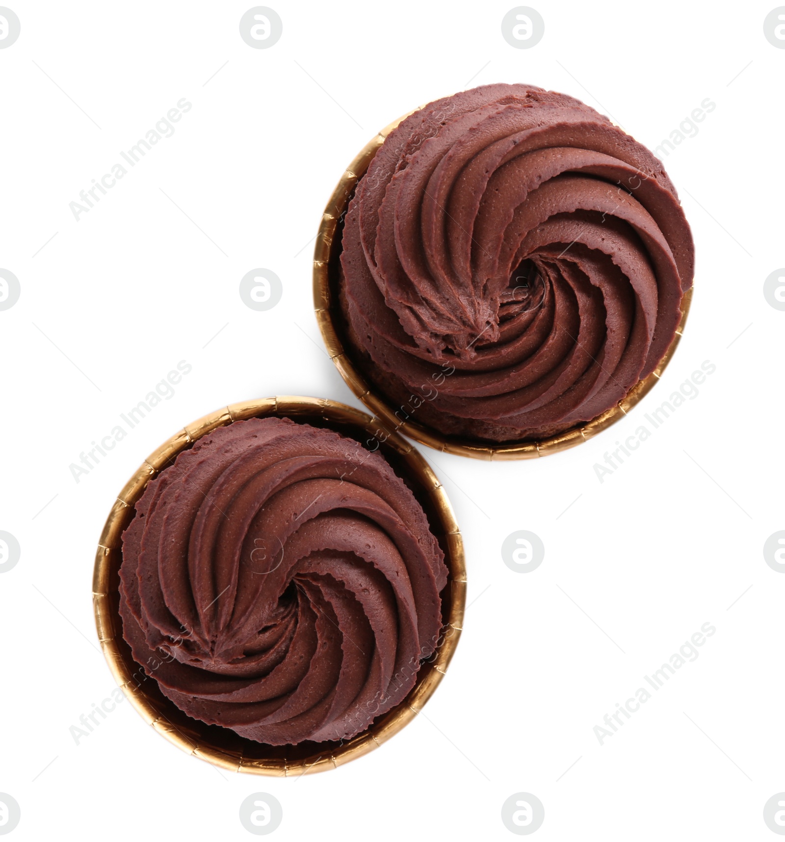 Photo of Delicious chocolate cupcakes isolated on white, top view