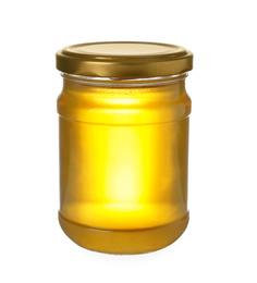 Photo of Jar with organic honey isolated on white