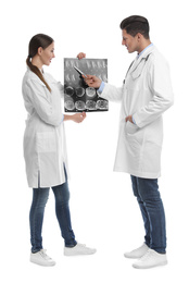 Photo of Orthopedists working with X-ray picture on white background