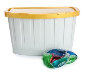 Laundry capsules and box on white background