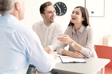 Human resources commission conducting job interview with applicant in office