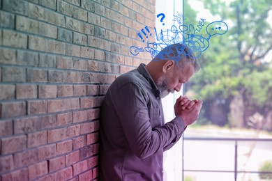 Image of Senior man suffering from dementia indoors. Illustration of messy thoughts during cognitive impairment