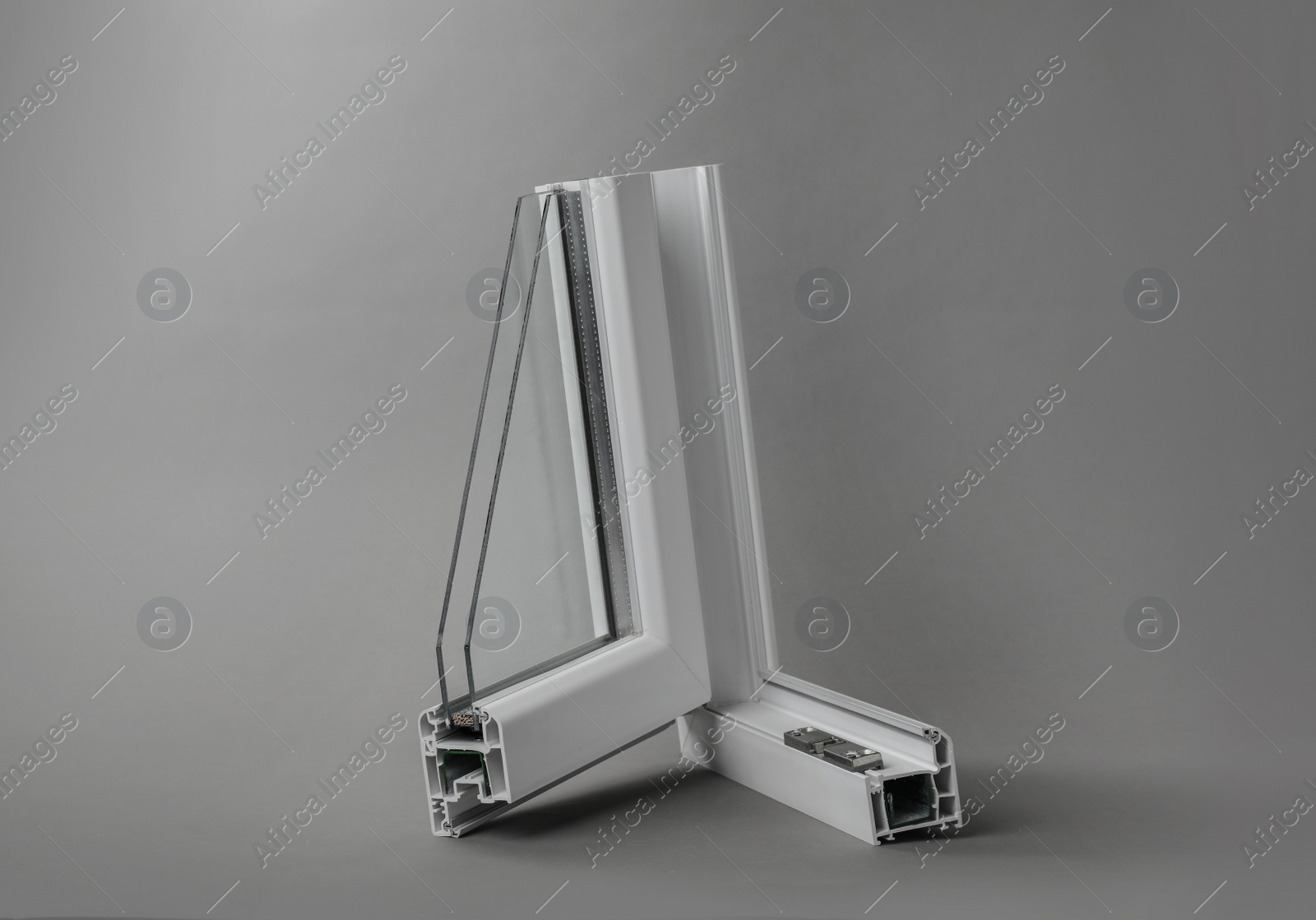 Photo of Sample of modern window profile on grey background