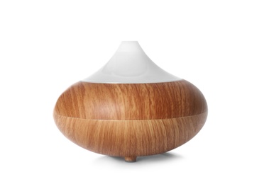 Photo of Aroma oil diffuser lamp on white background