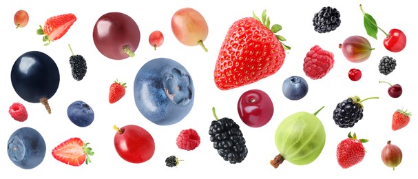 Image of Many different fresh berries falling on white background