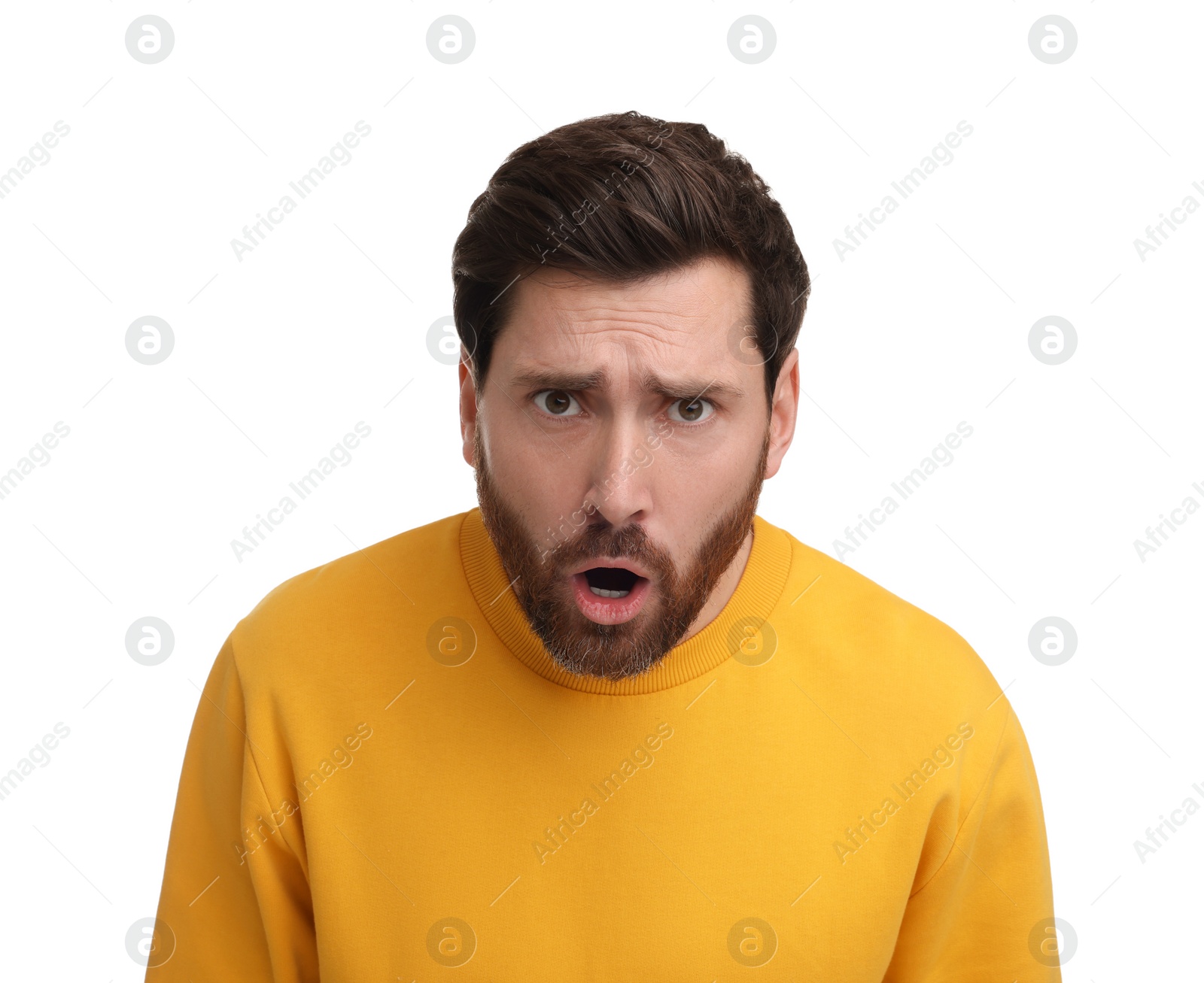 Photo of Portrait of surprised man isolated on white