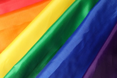 Photo of Rainbow LGBT flag as background, closeup view