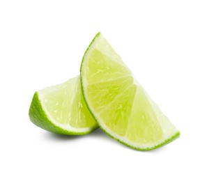 Photo of Citrus fruit. Slices of fresh lime isolated on white