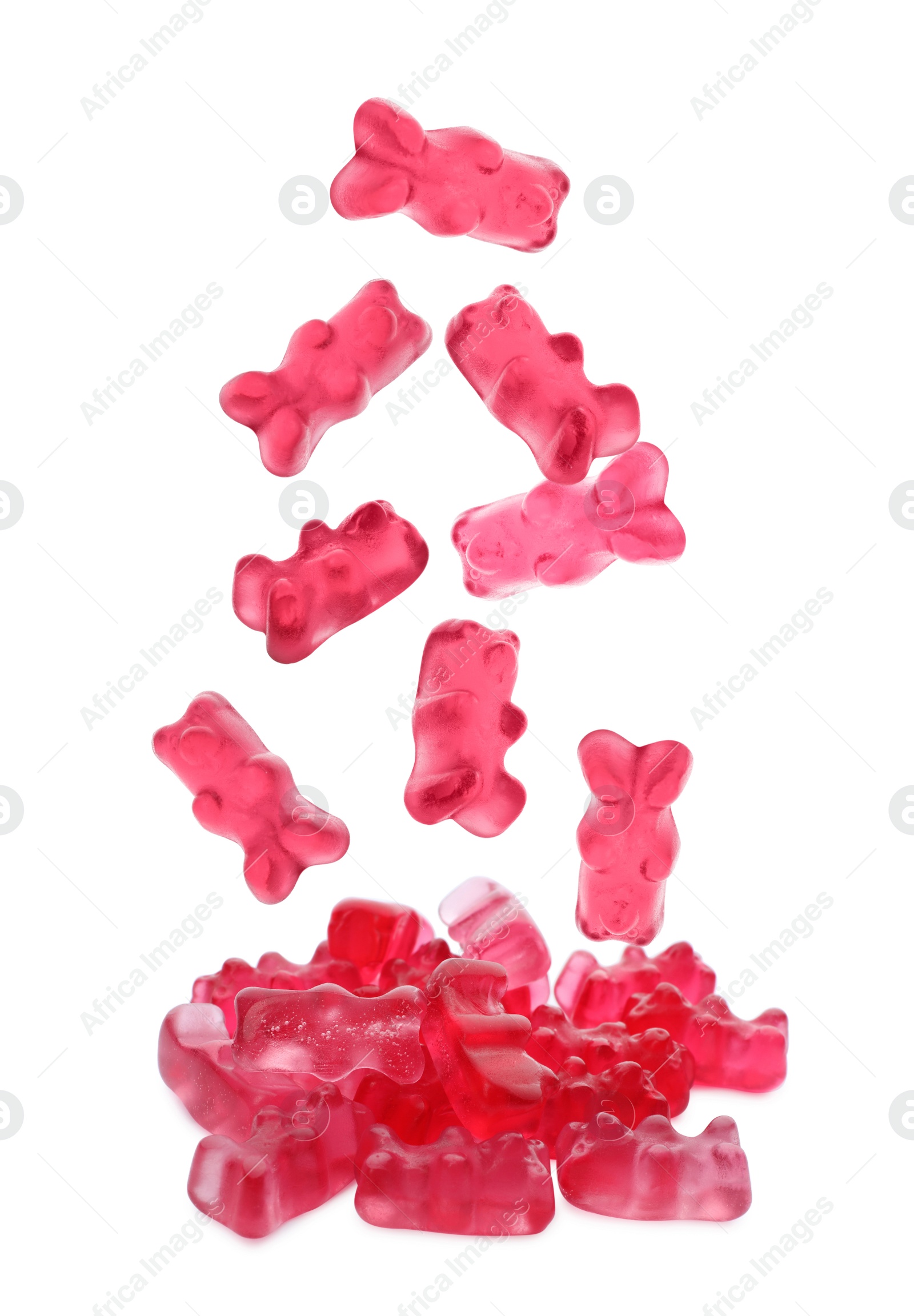 Image of Delicious jelly bears falling on white background