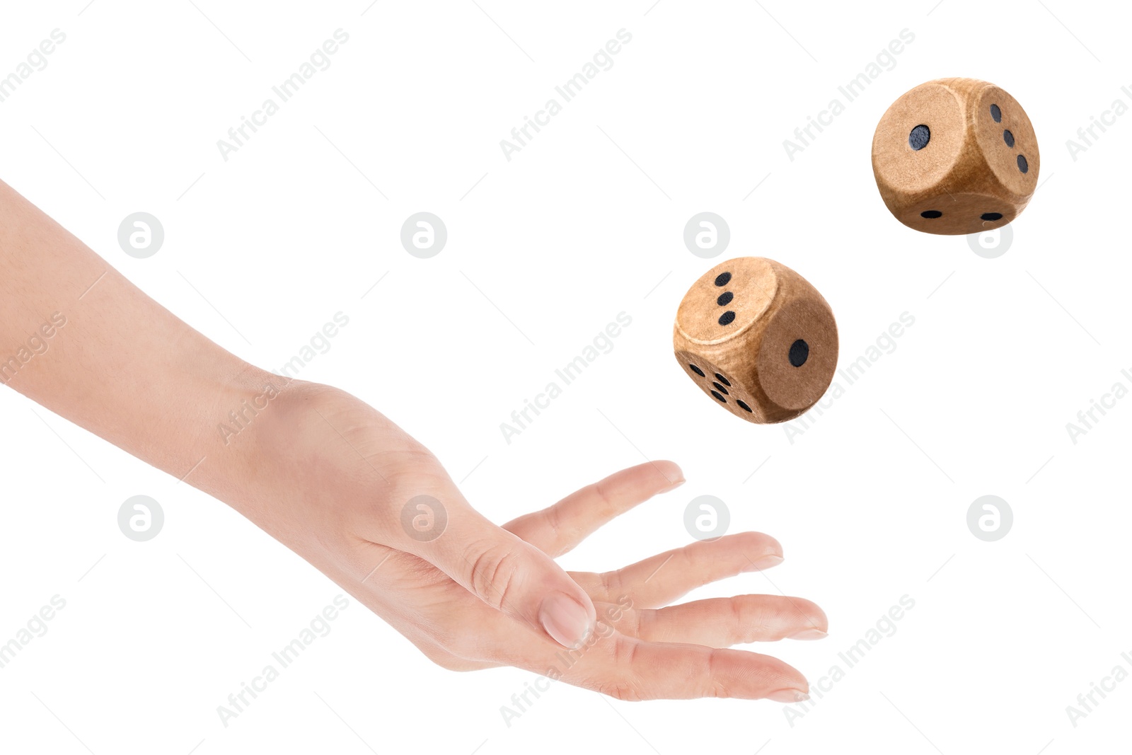 Image of Woman throwing wooden dice on white background, closeup