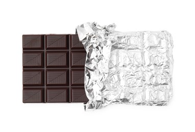 Delicious dark chocolate bar wrapped in foil isolated on white, top view