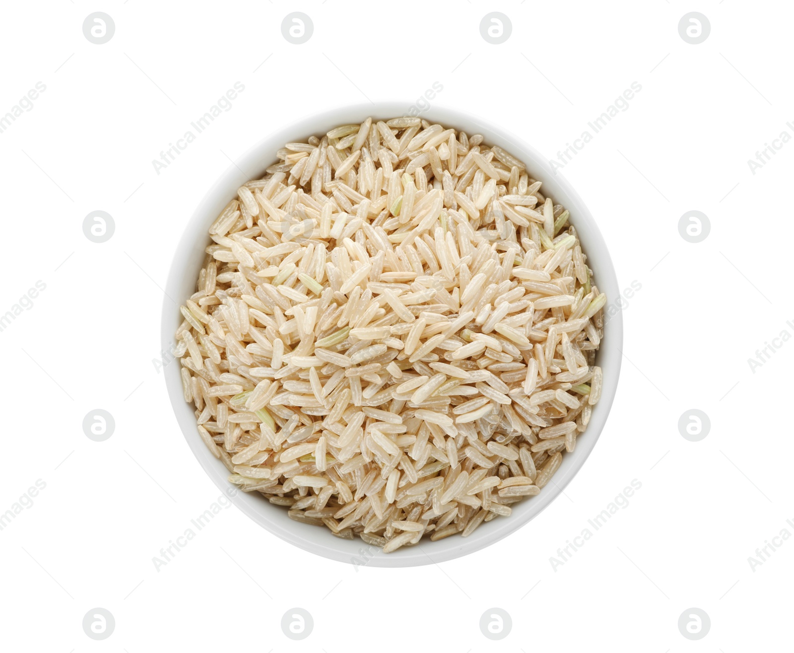 Photo of Ceramic bowl with brown rice on white background, top view