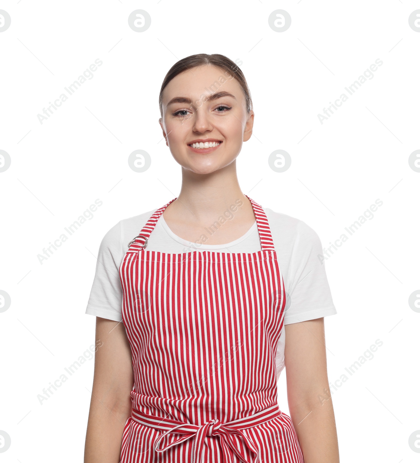 Photo of Beautiful young woman in clean striped apron on white background