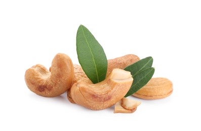 Photo of Pile of tasty organic cashew nuts and green leaves isolated on white