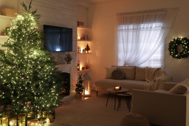 Photo of Stylish living room interior with TV set, Christmas tree and fireplace