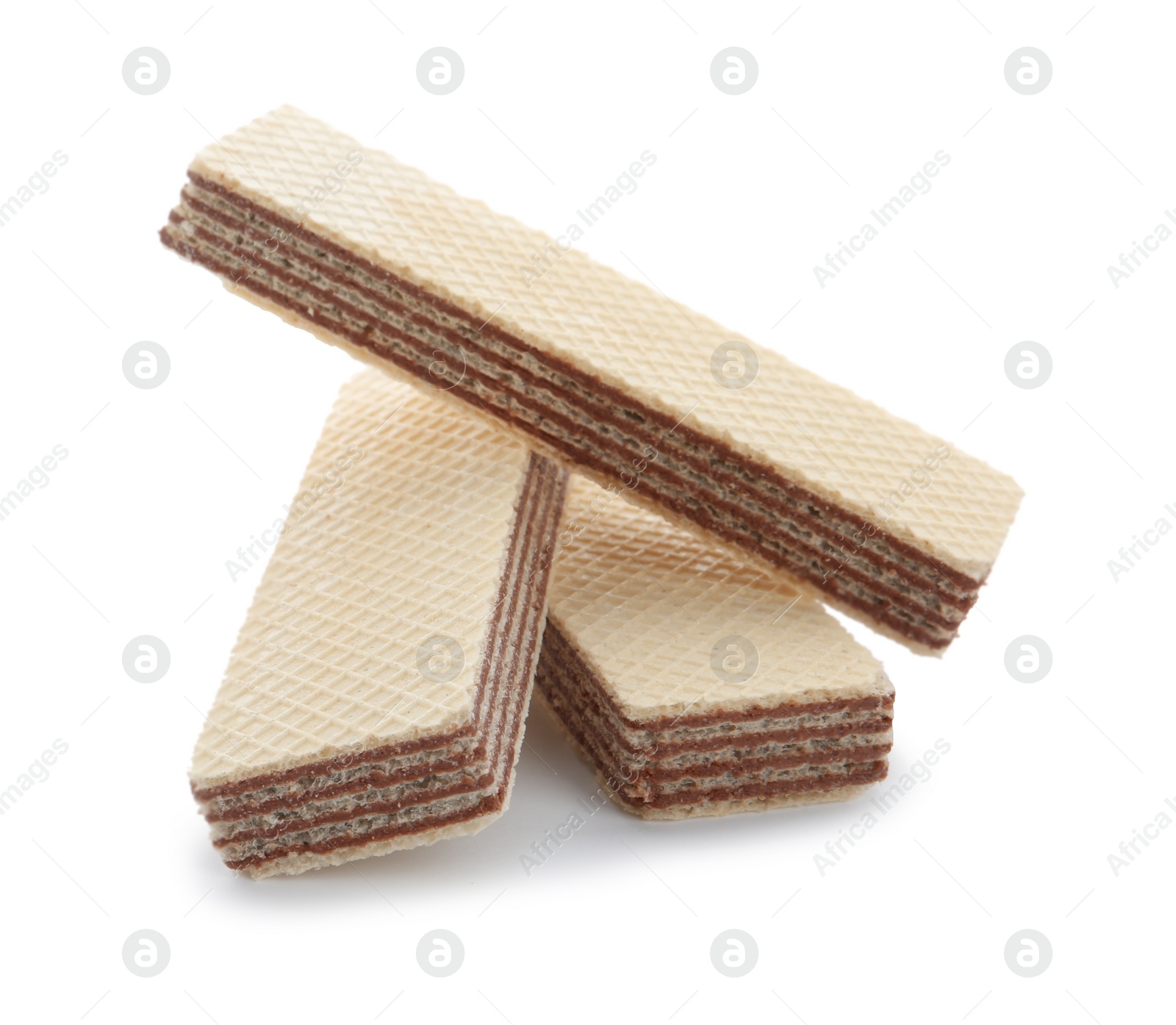 Photo of Delicious crispy wafers on white background. Sweet food