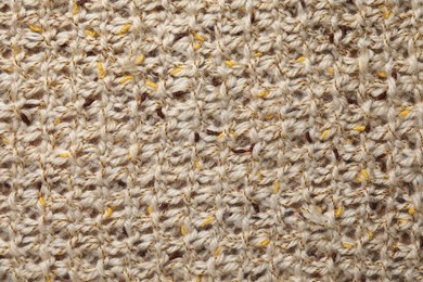 Texture of knitted fabric as background, top view