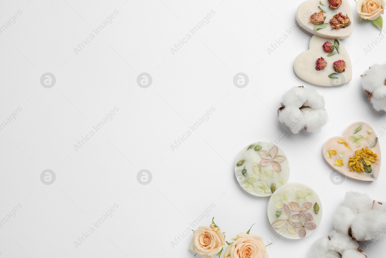 Photo of Composition with scented sachets on white  background, top view