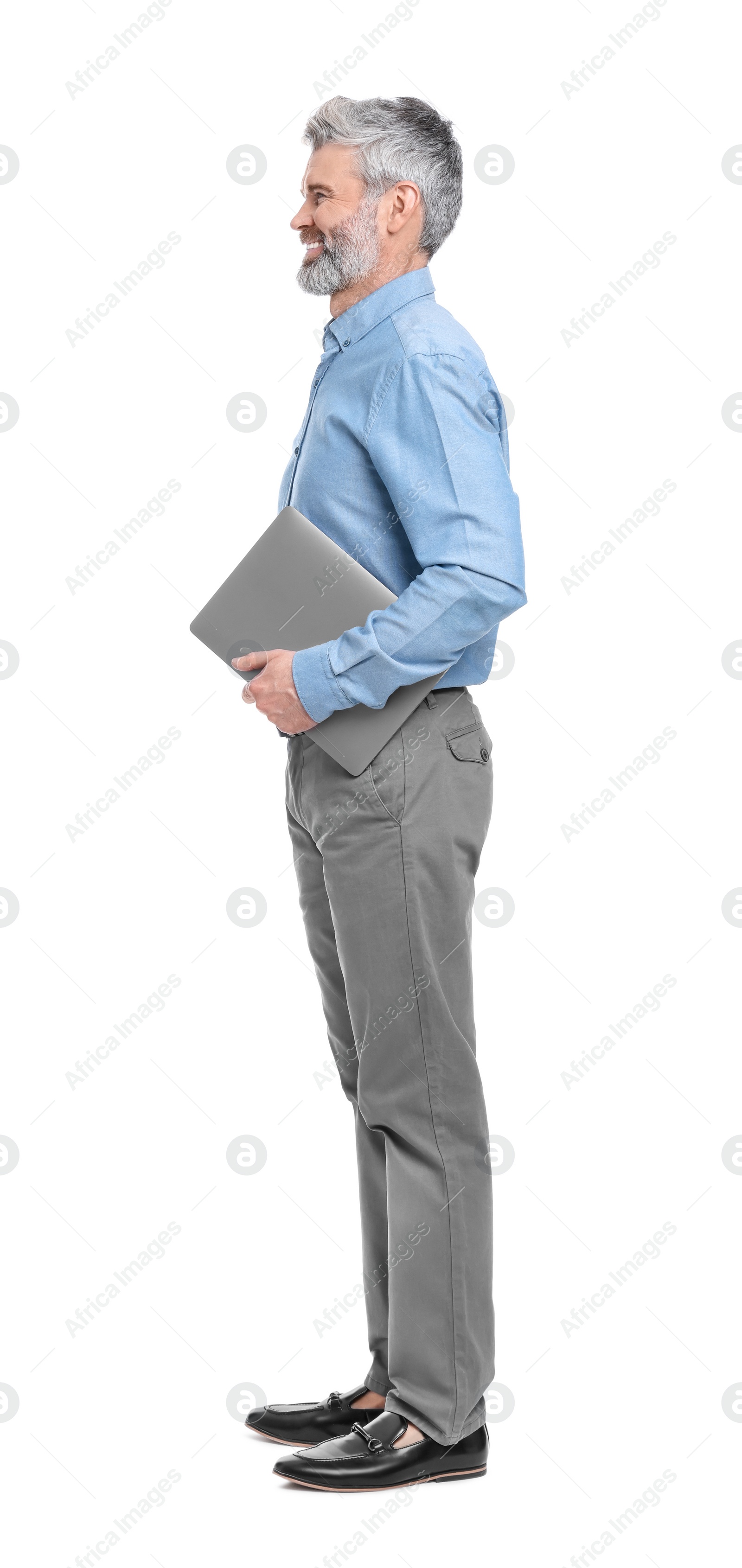 Photo of Mature businessman in stylish clothes with laptop on white background