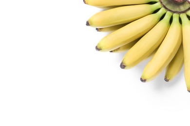 Photo of Bunch of ripe baby bananas on white background, top view