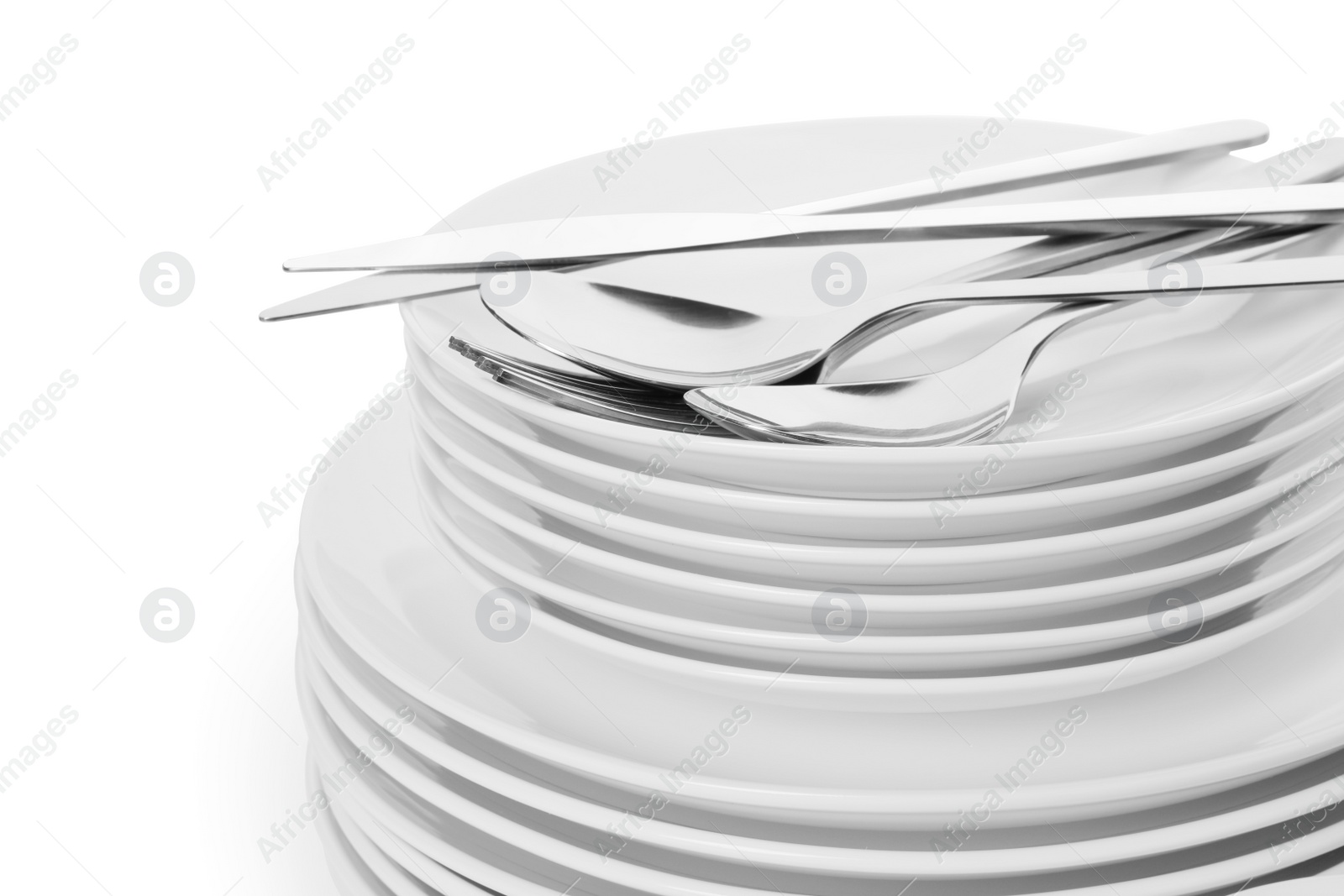 Photo of Set of clean tableware on white background, closeup. Washing dishes