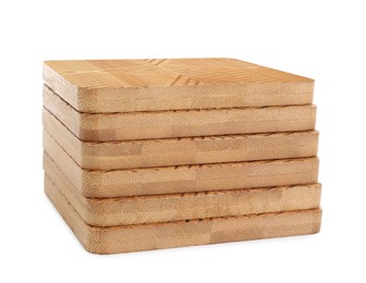 Stack of wooden cup coasters on white background