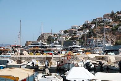 Photo of Beautiful view of port with different boats on sunny day