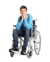 Photo of Teenage boy in wheelchair on white background