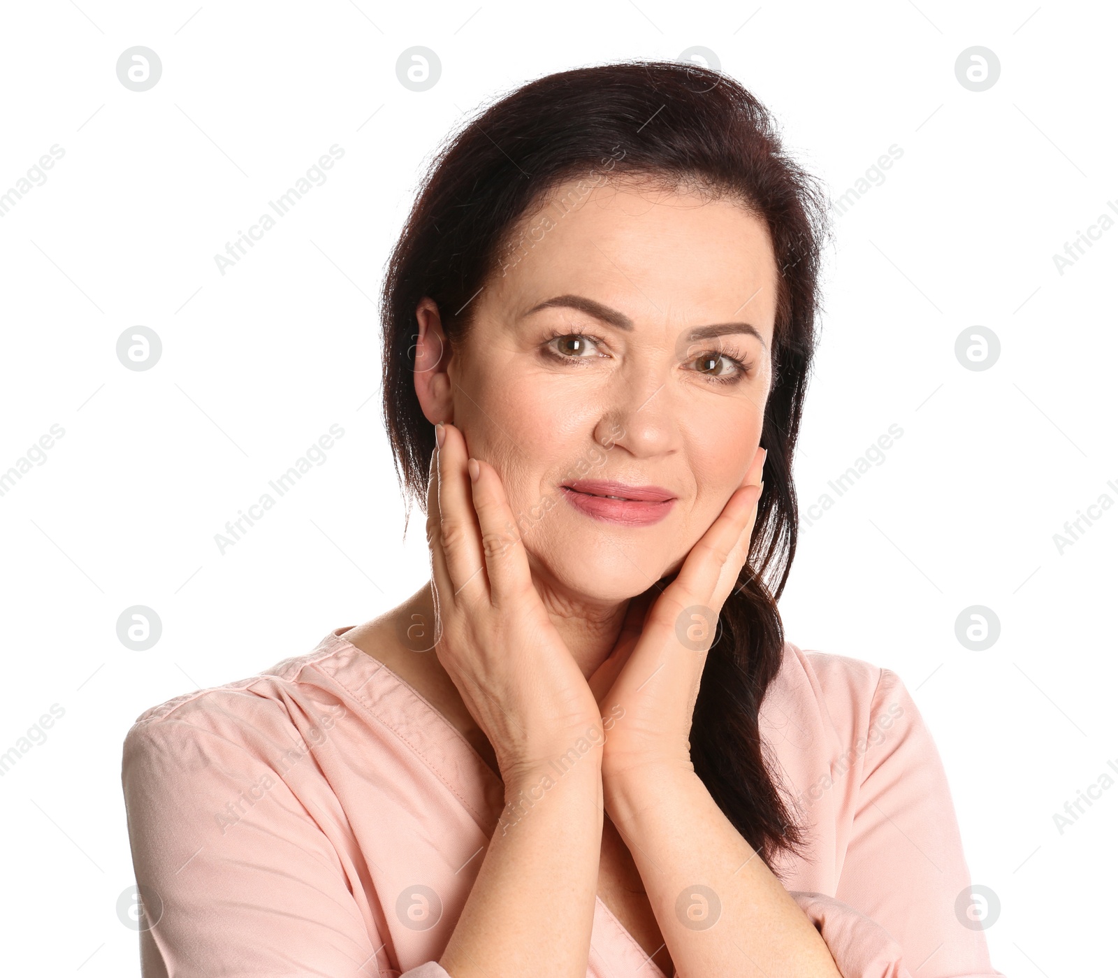 Photo of Portrait of charming mature woman with healthy beautiful face skin and natural makeup on white background