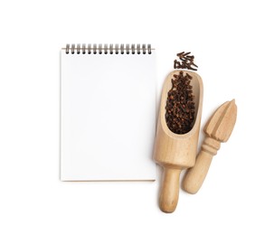 Photo of Blank recipe book, spices and wooden utensils on white background, top view. Space for text