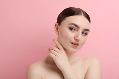 Photo of Makeup product. Woman with black eyeliner and beautiful eyebrows on pink background