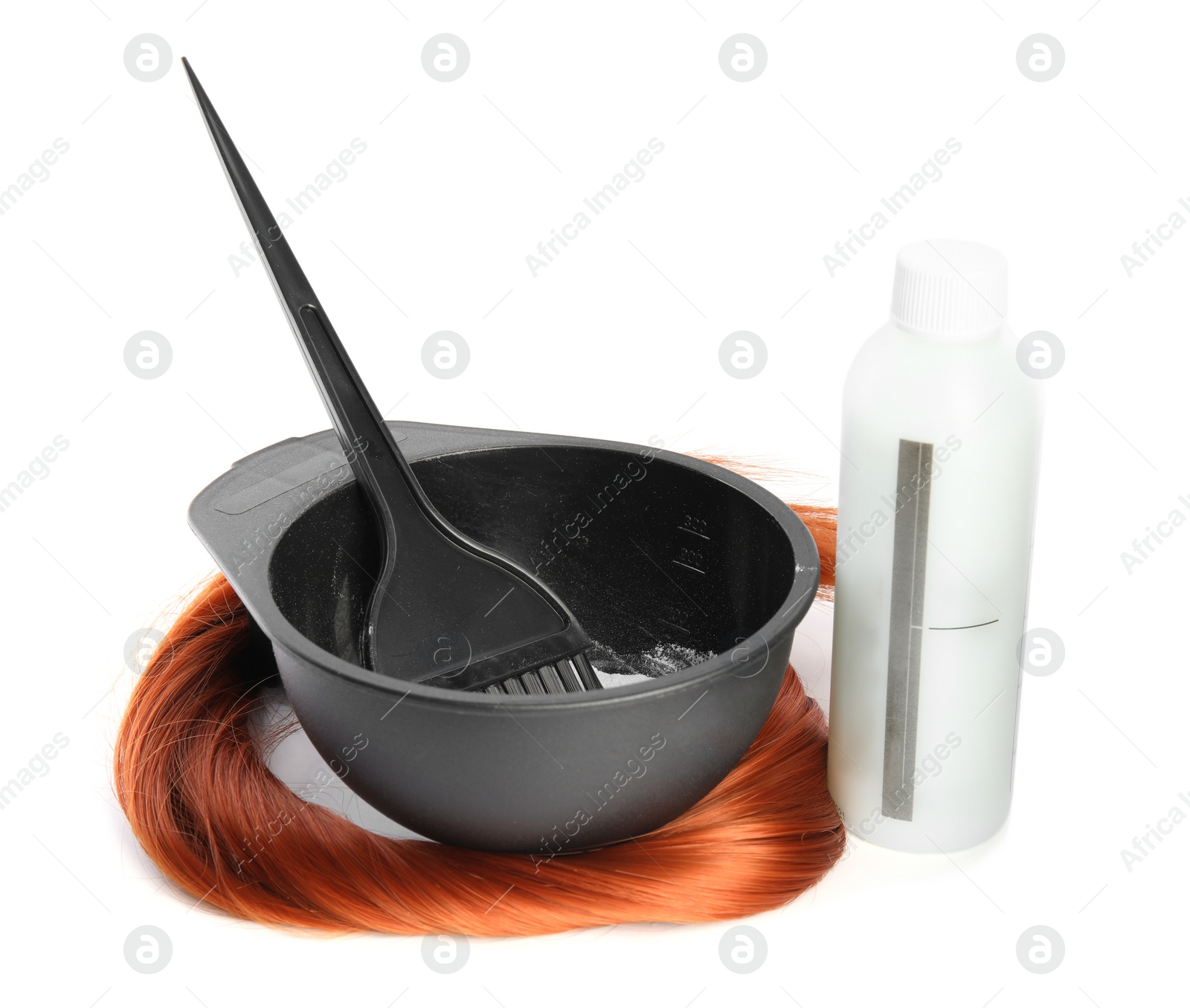 Photo of Professional tools for hair dyeing on white background