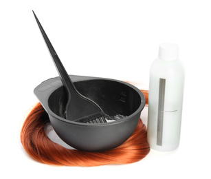 Photo of Professional tools for hair dyeing on white background