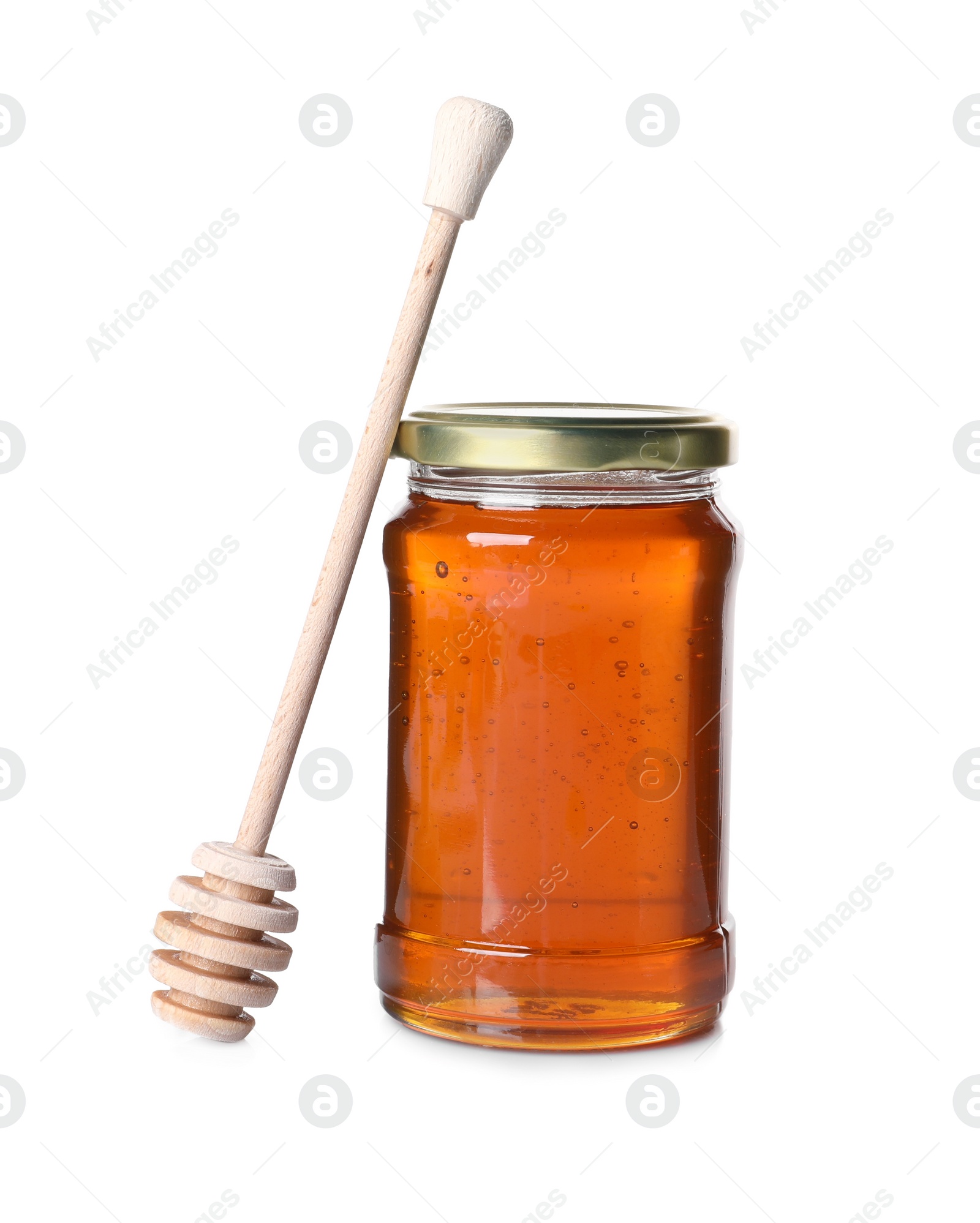 Photo of Tasty natural honey in glass jar and dipper isolated on white