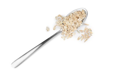 Photo of Raw oatmeal and spoon on white background, top view